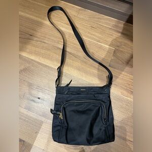 Tumi nylon cross body bag with gold accents